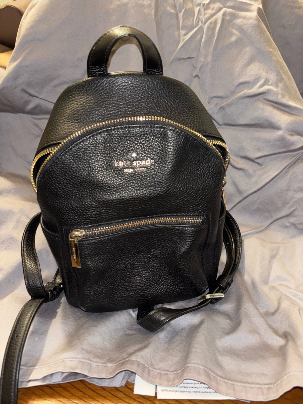 kate spade black pebbled leather mini backpack with gold hardware